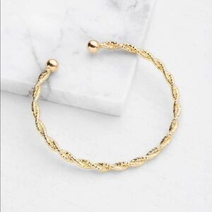 5/$25 TWISTED GOLD CUFF
